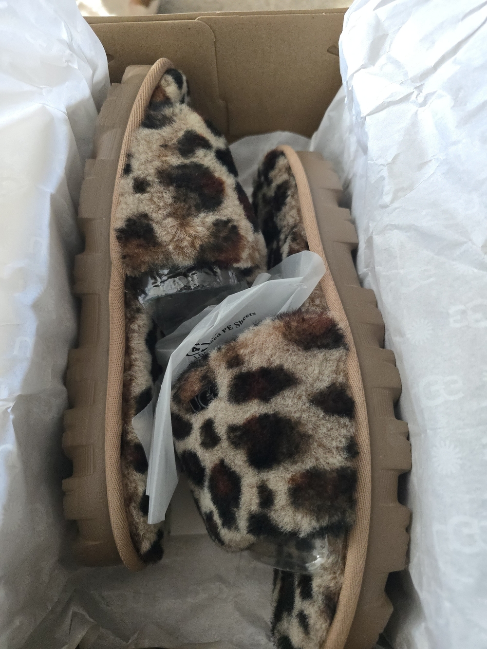 UGG Leopard Print Faux Fur Slide Mules in Tan/Brown